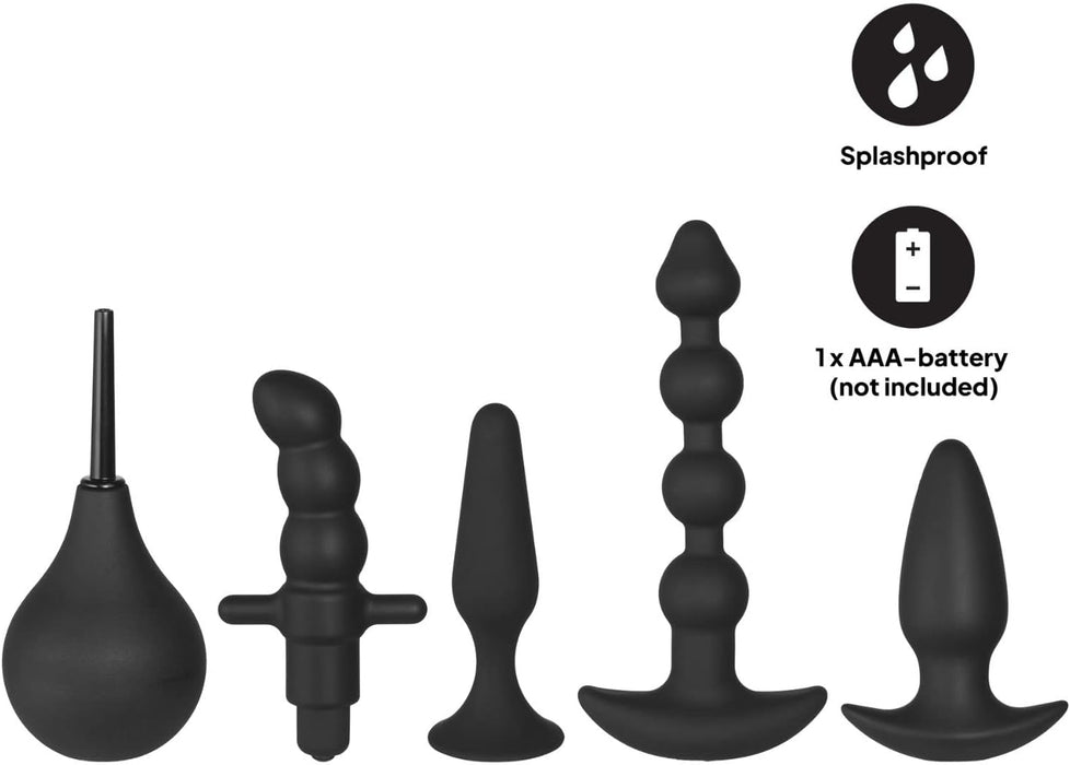 Complete anal plug set with silicone plugs of various sizes and a vibrator