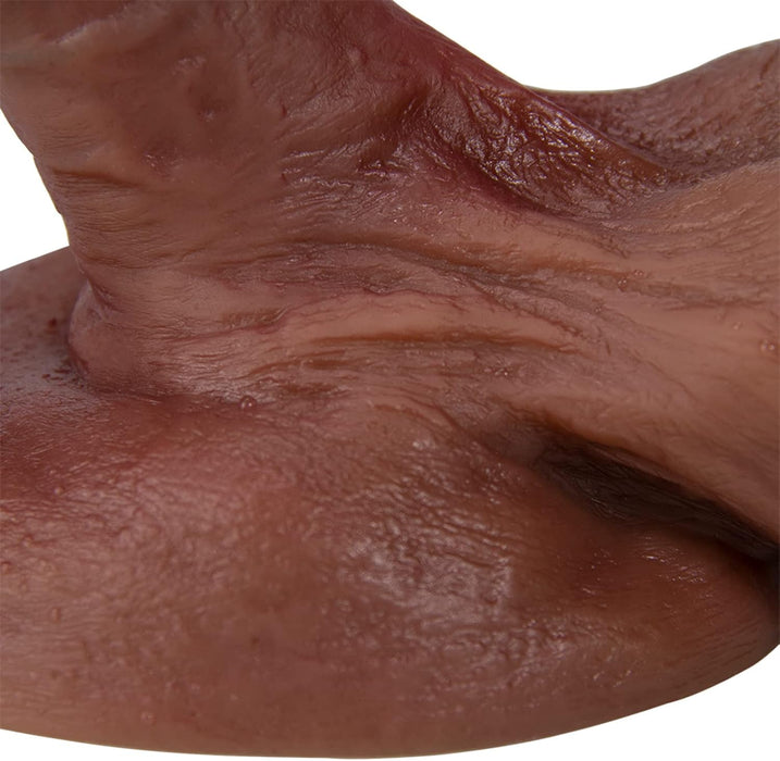 Realistic XL silicone dildo with strong attachment pad and 45° tilt