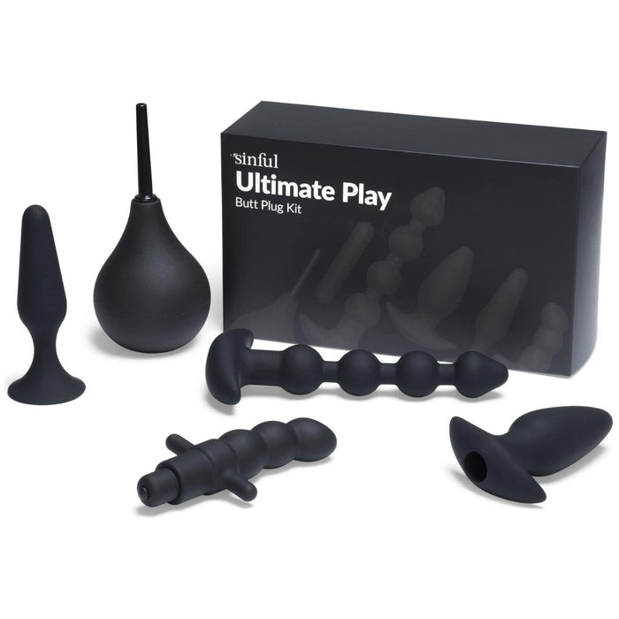 Complete anal plug set with silicone plugs of various sizes and a vibrator